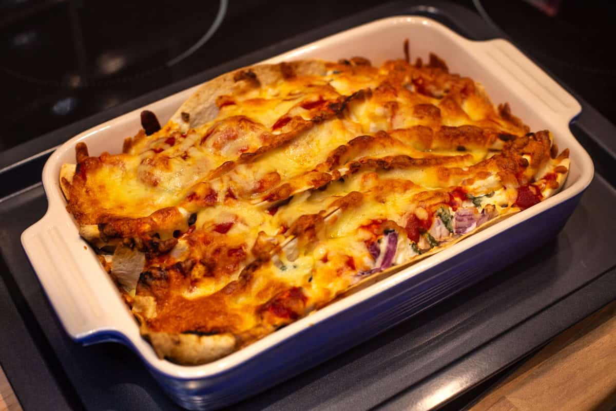 Cooked creamy zigzag tortilla bake.