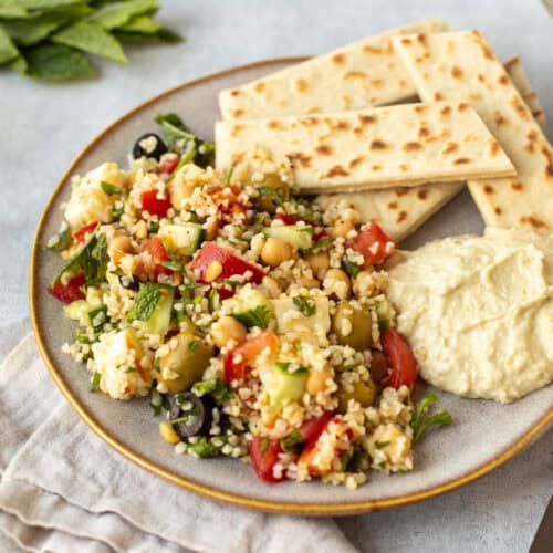 Extra special tabbouleh salad with halloumi and olives.