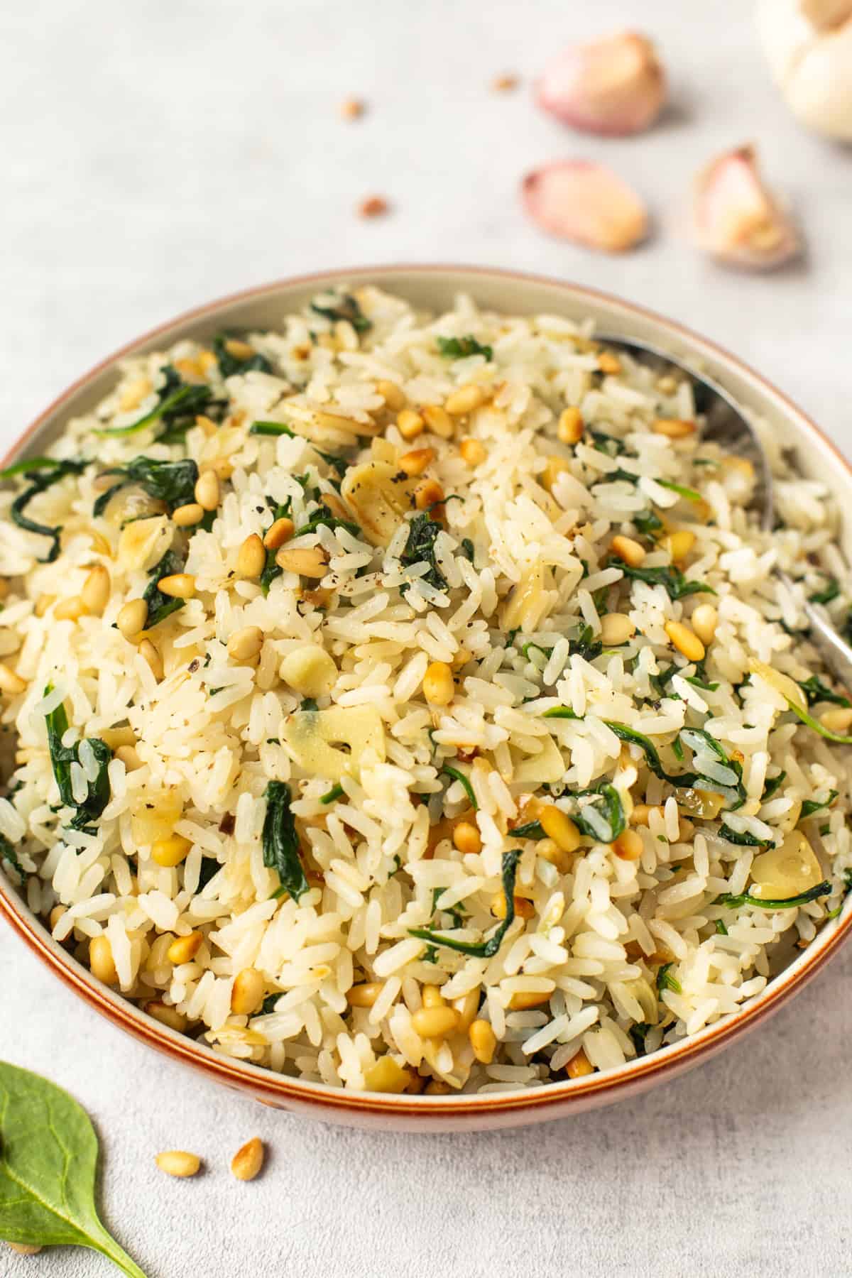 Garlic spinach rice with pine nuts.