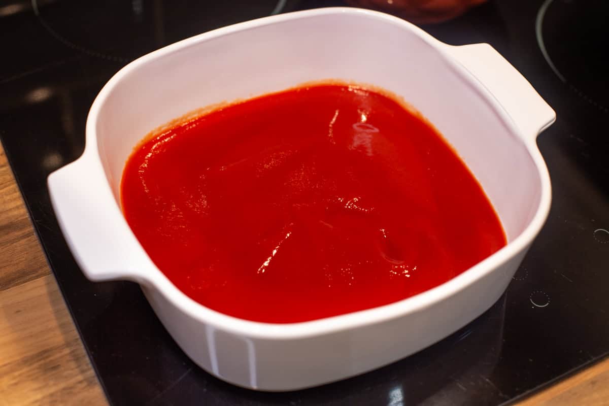 Tomato sauce in a baking dish.