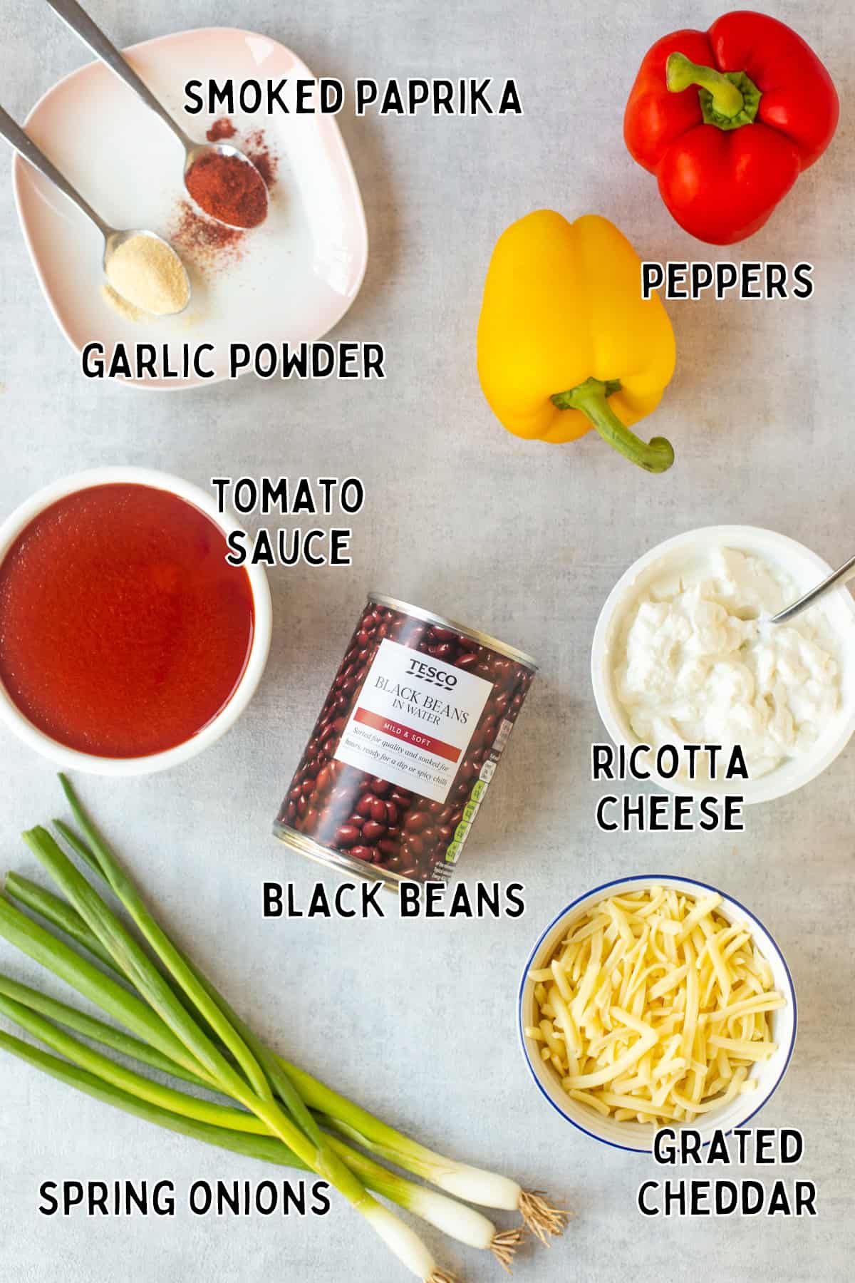 Ingredients for ricotta stuffed peppers laid out with text overlay.