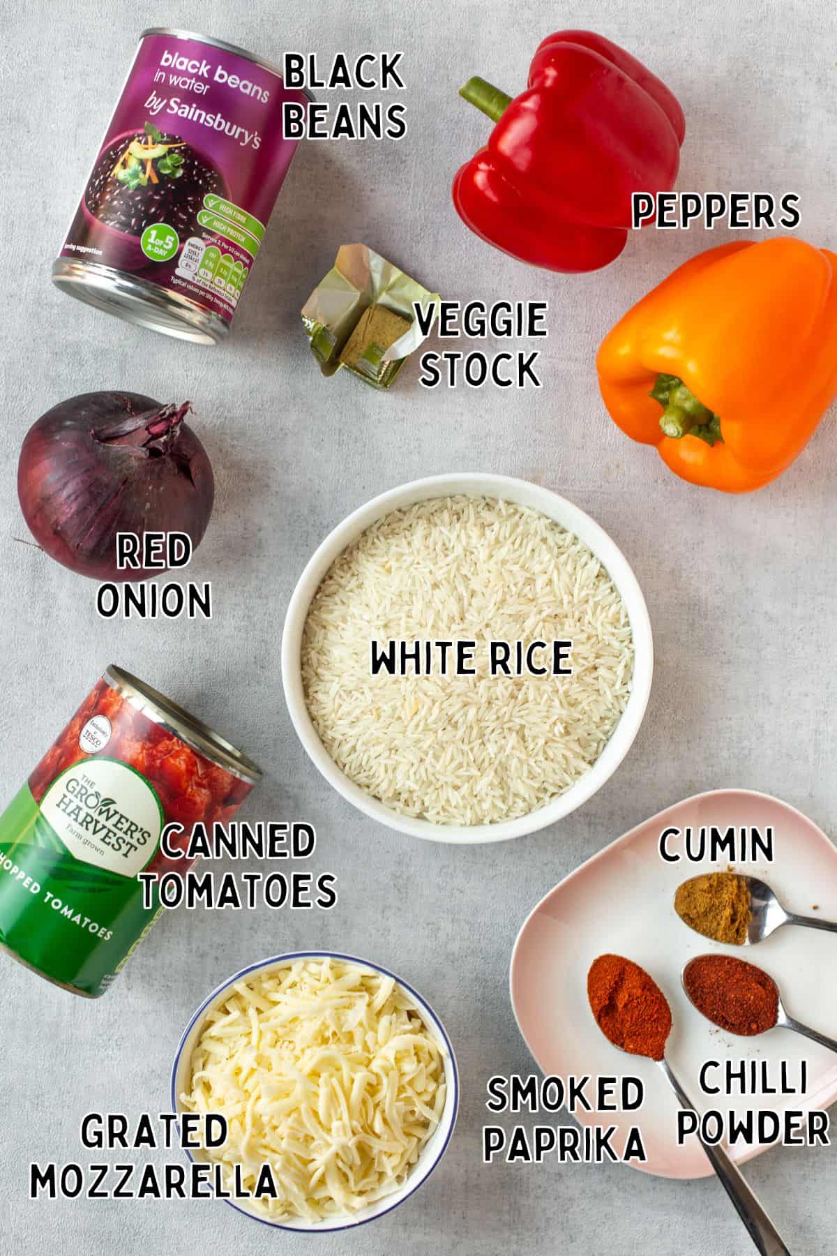 Ingredients for baked fajita rice laid out with text overlay.