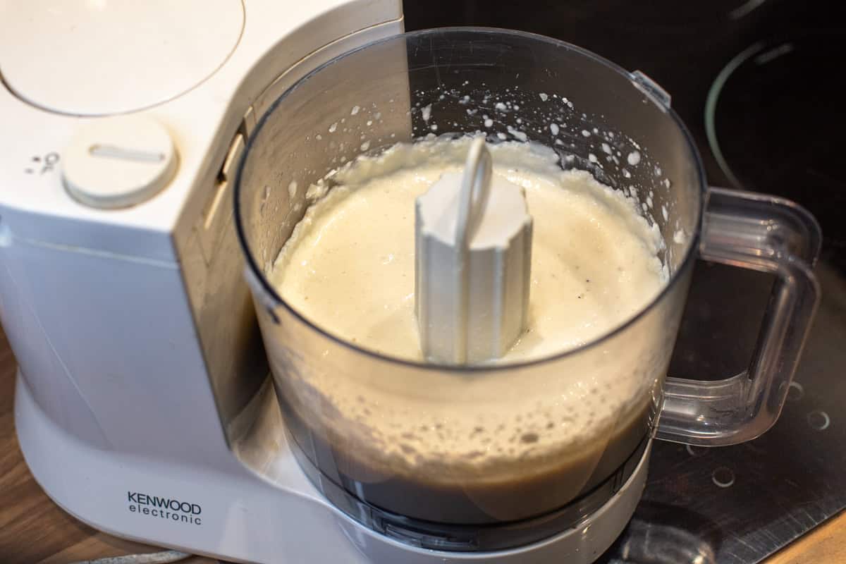 Creamy blended tofu in a food processor.