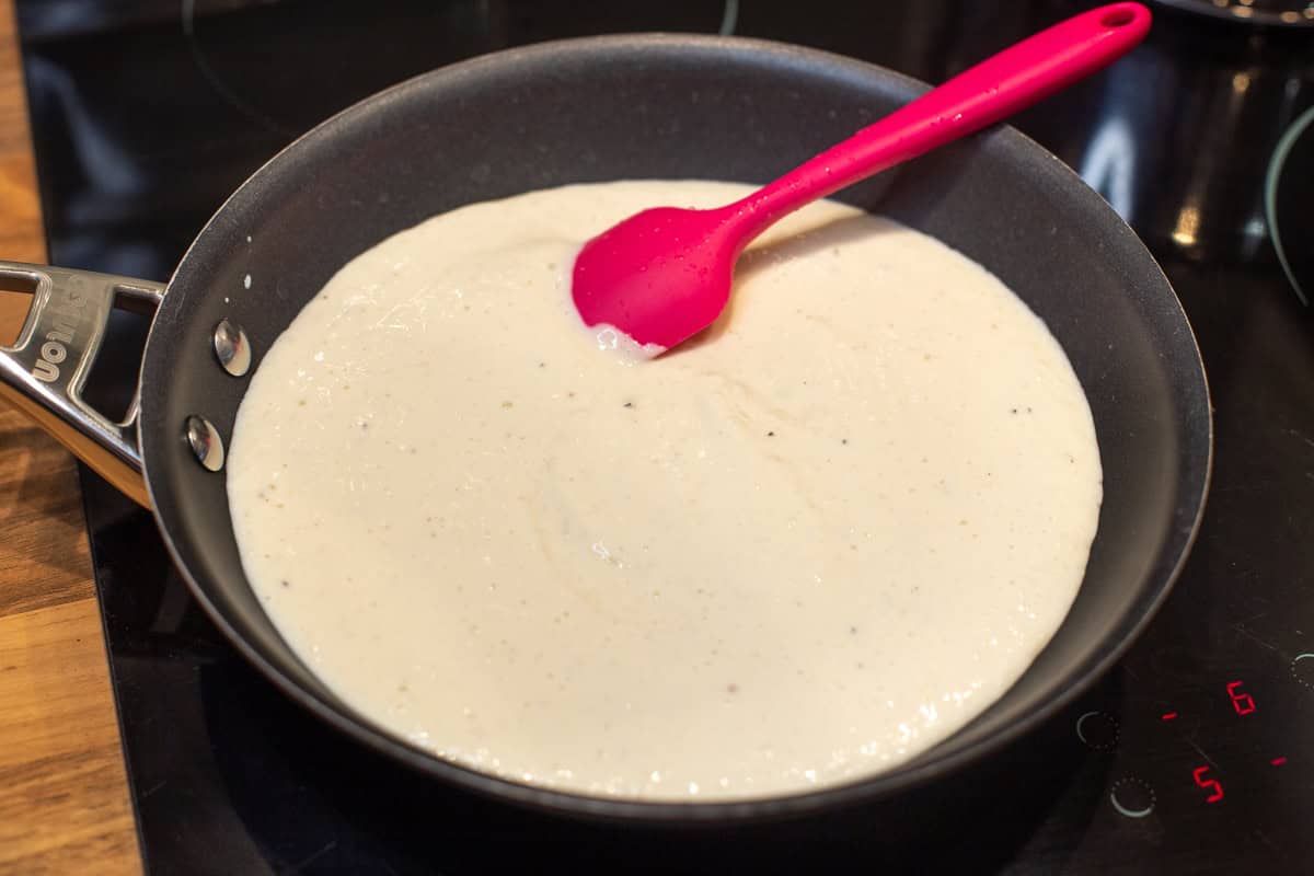 Creamy blended tofu in a frying pan.