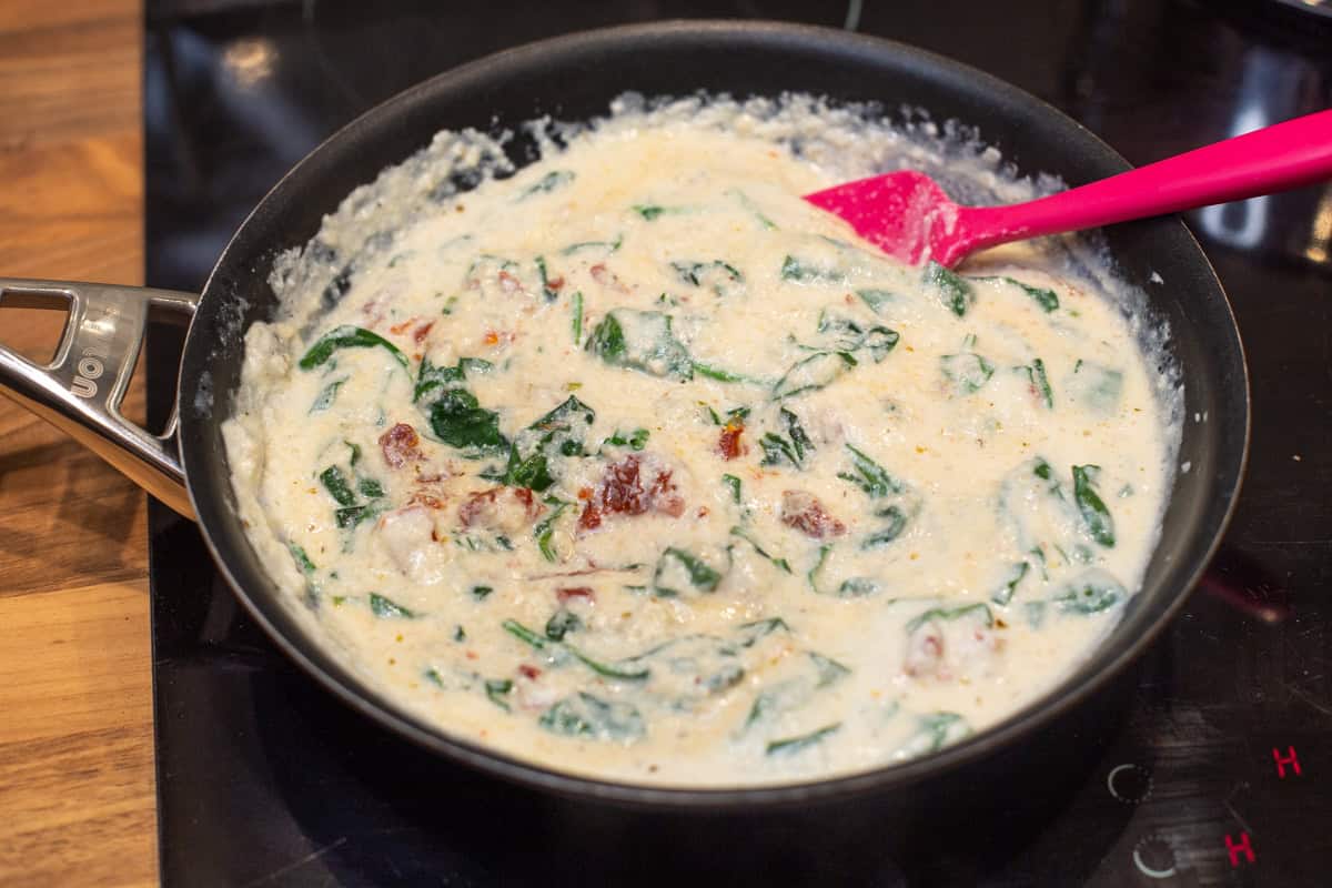 Creamy tofu sauce in a frying pan.